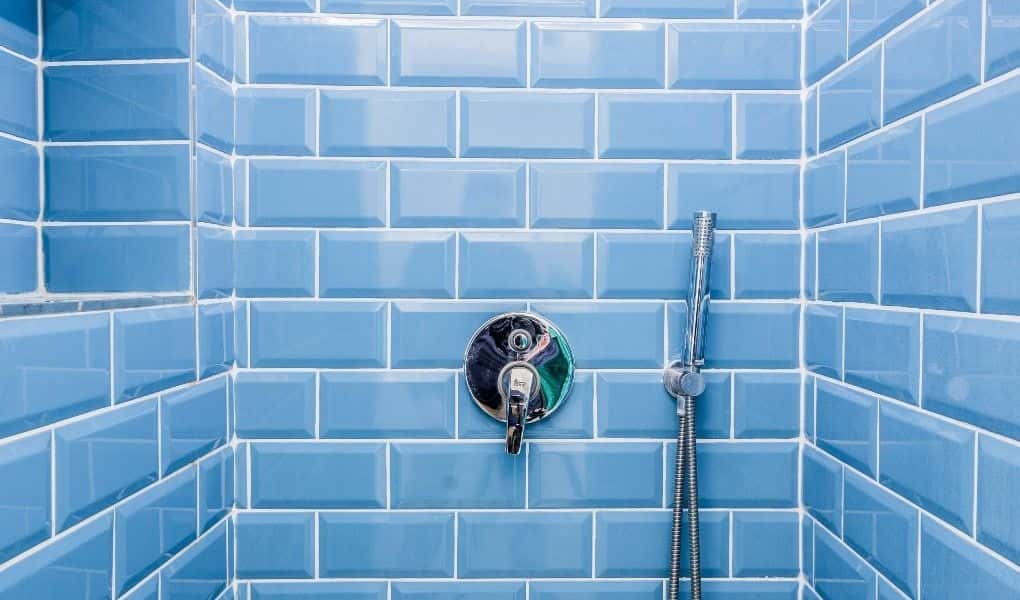 Insufficient Matting Allegedly Causes Woman to Fall in Fitness Club Shower