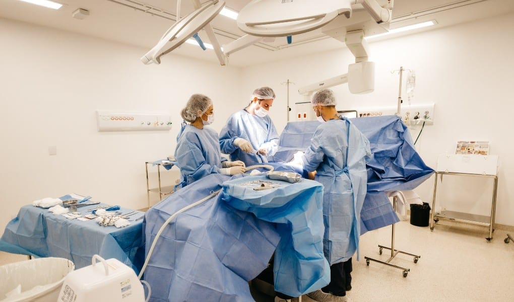 physicians performing surgery