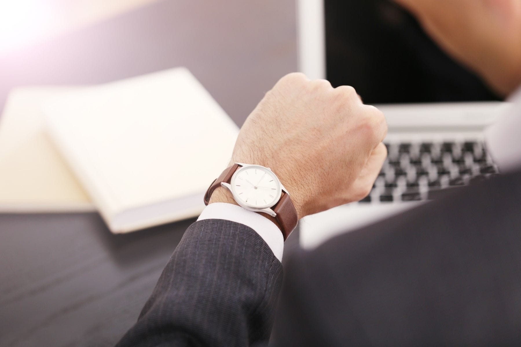 Attorney checking watch