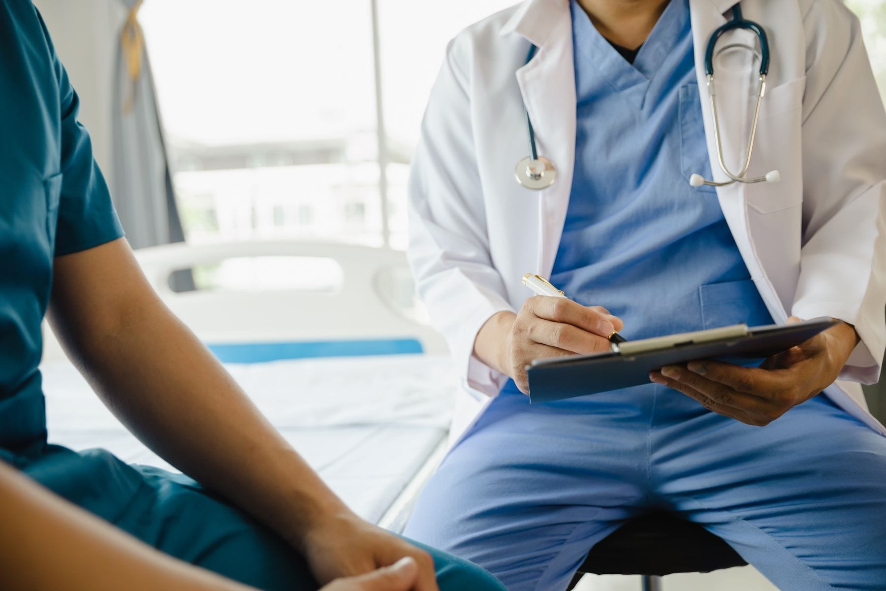 Doctor talking with patient
