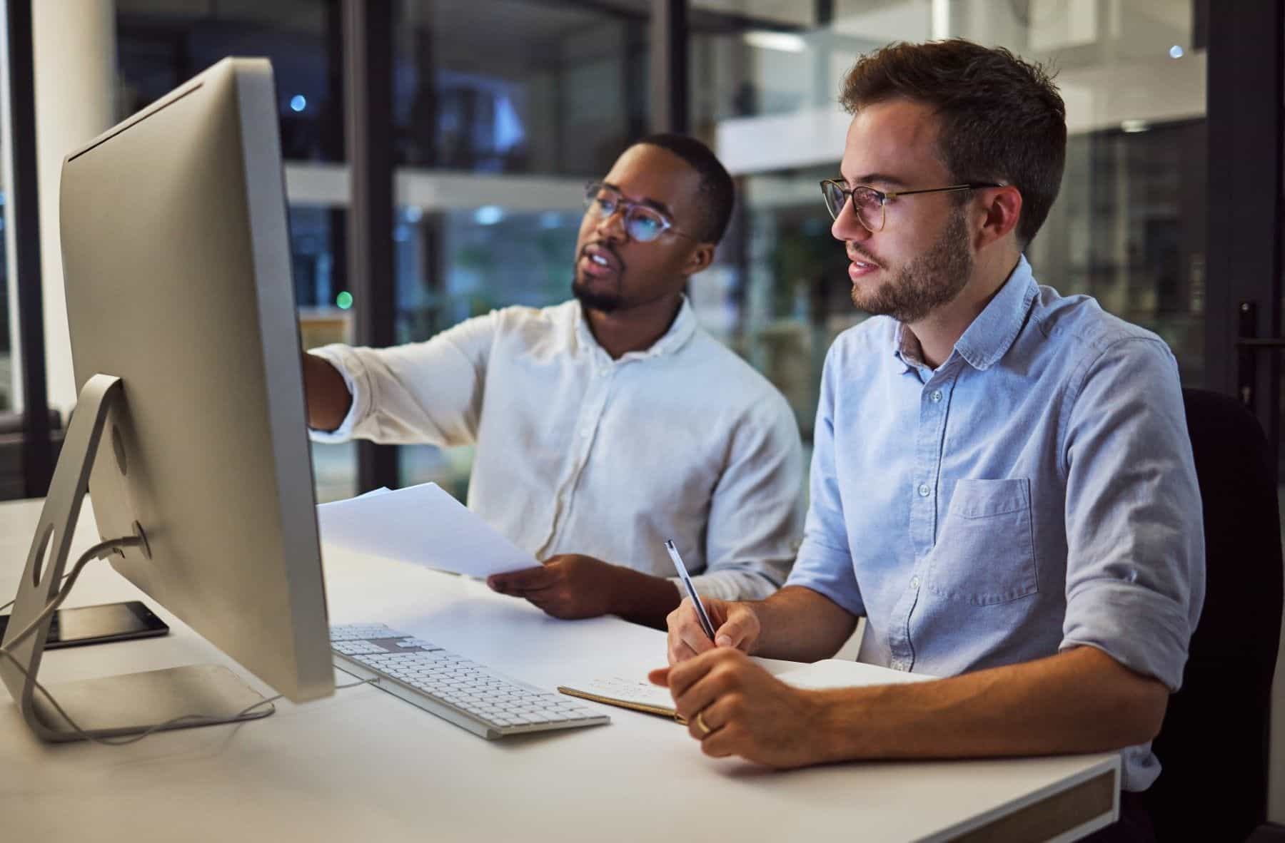 Two professionals researching