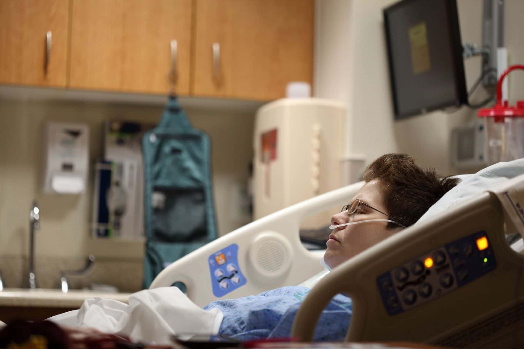 Woman in hospital bed