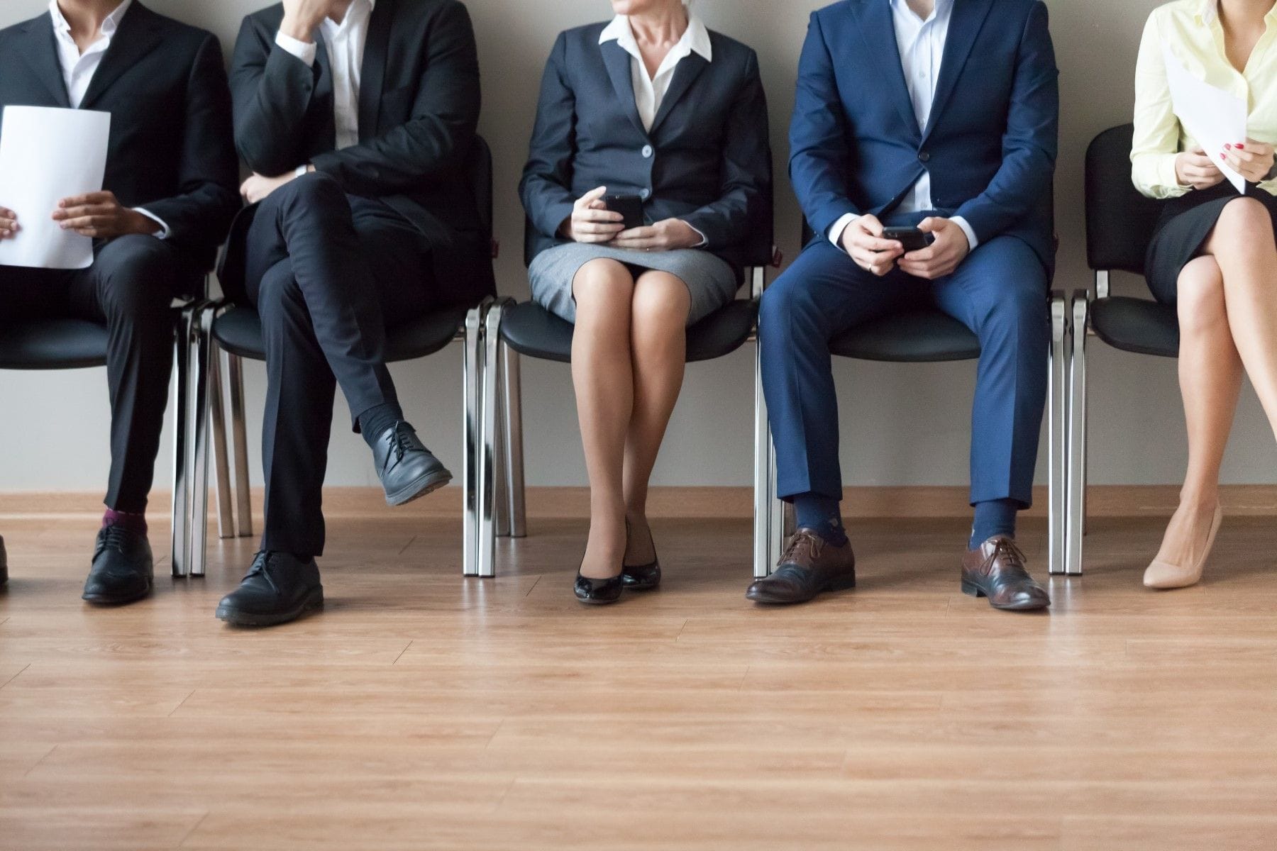 Group of professionals sitting in chairs