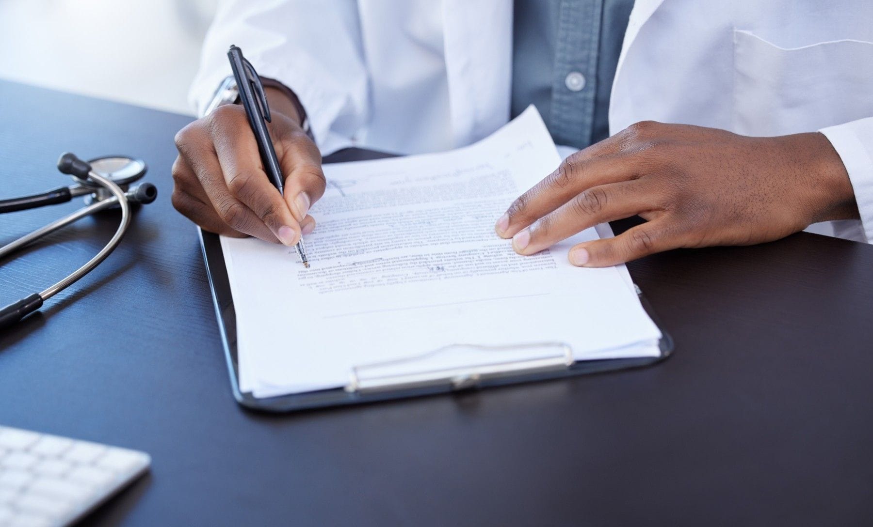 Medical Professional Signing