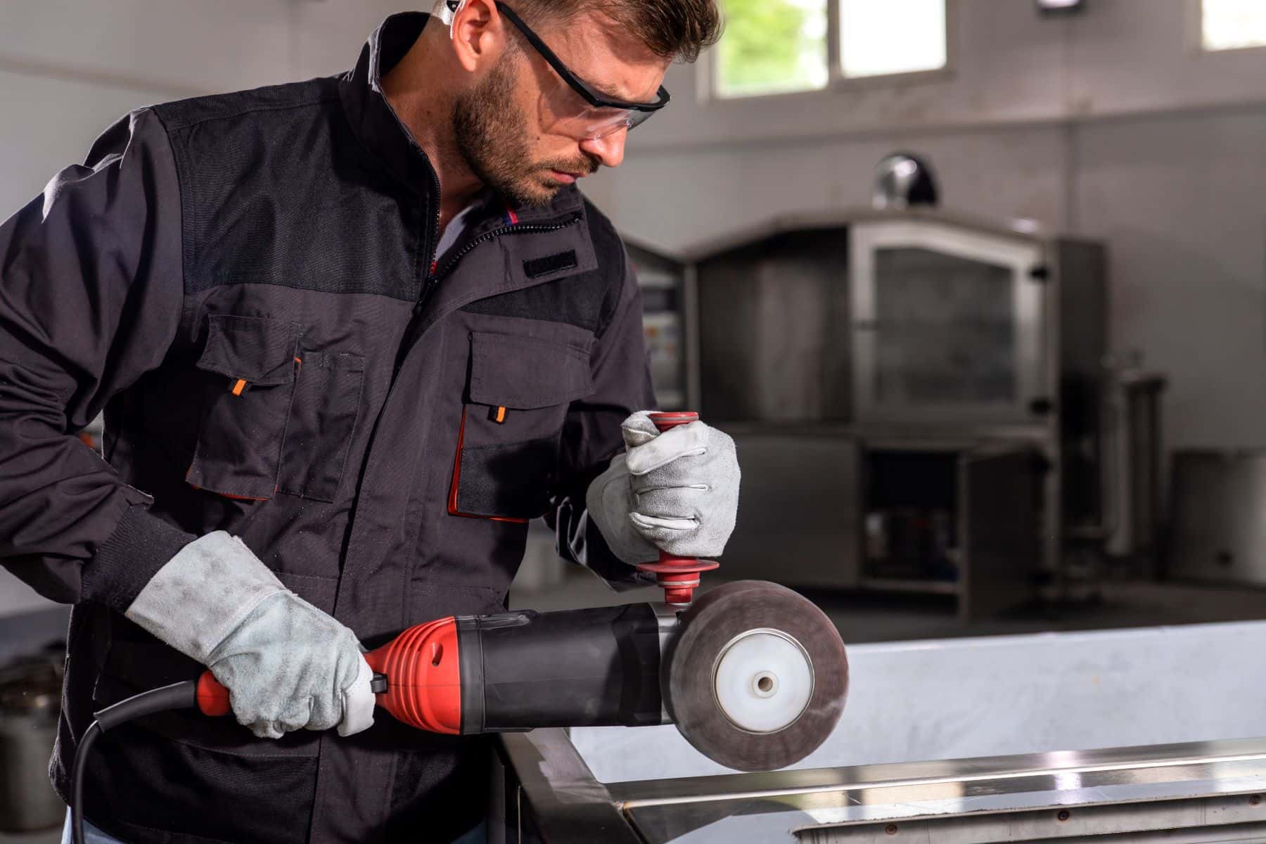 Man using angle grinder