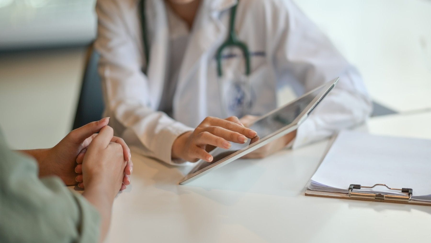 Doctor talking with patient